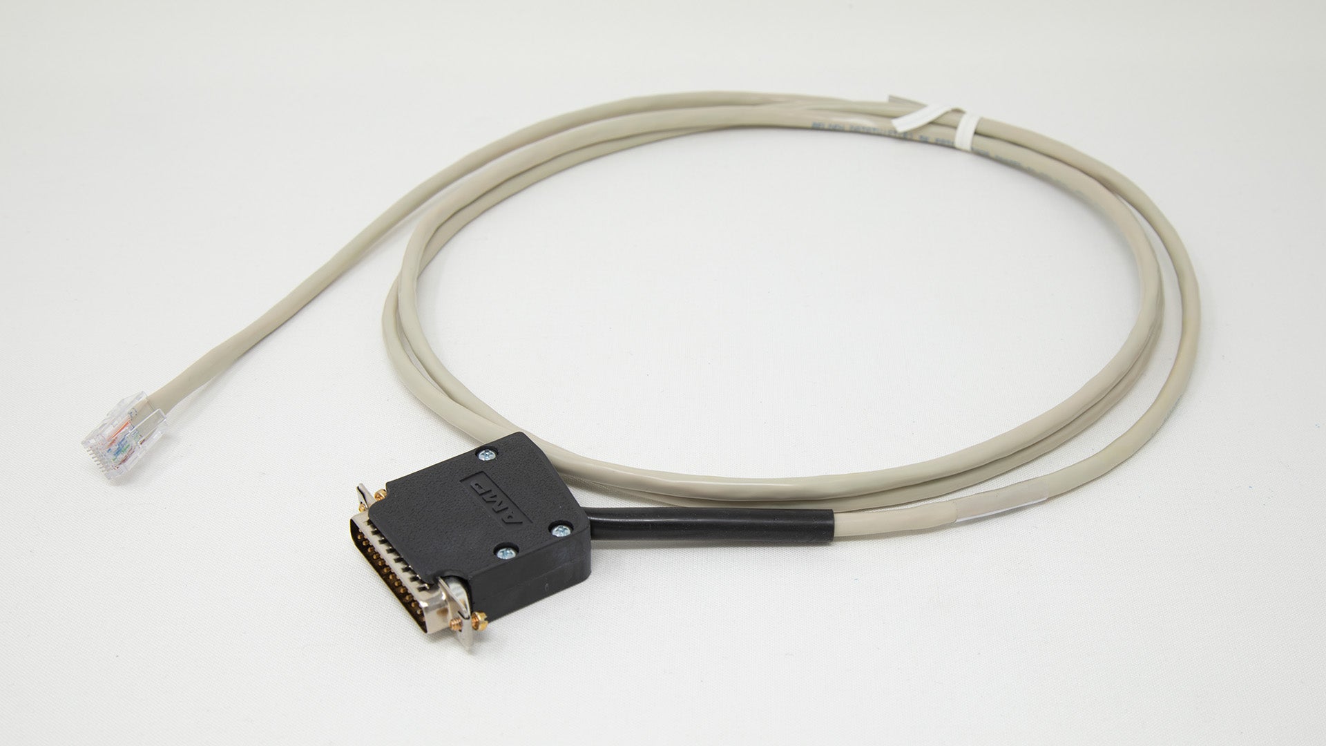 Cable with serial computer connection at one end and ethernet at other.