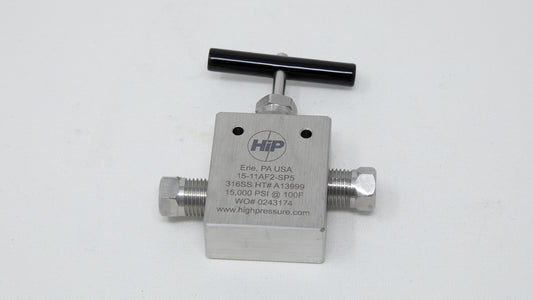 A small metal valve featuring a black handle, designed for controlling fluid flow in various applications.