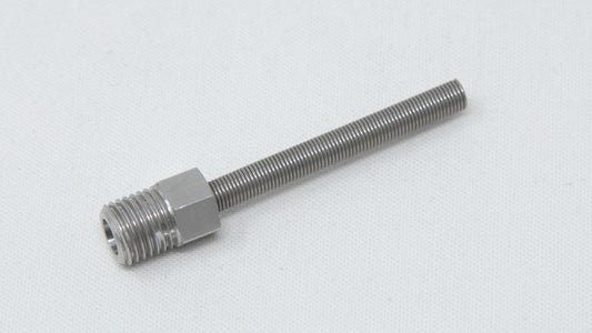 A screw and a metal nut placed on a white surface, emphasizing their metallic finish and structure.