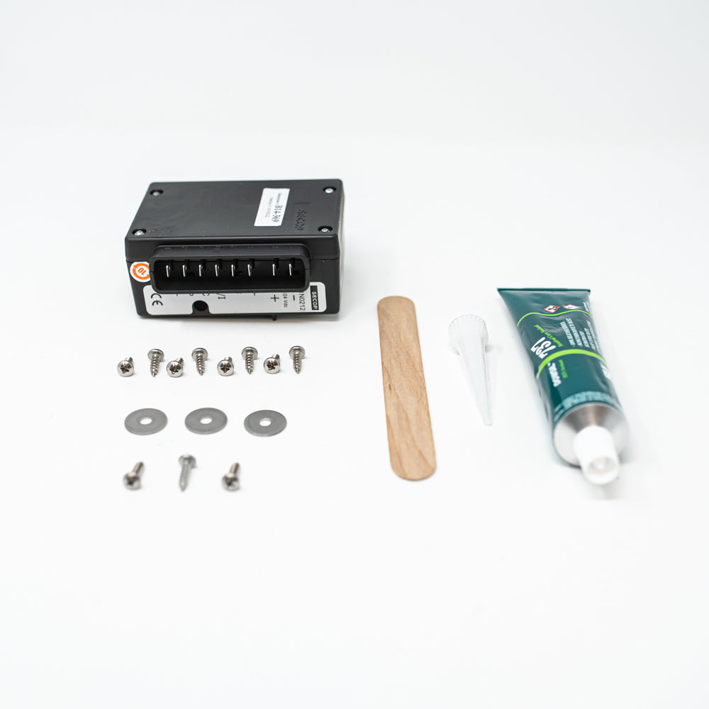 Electronic unit. tube of silicone sealant, application stick and appropriate screws and washers.