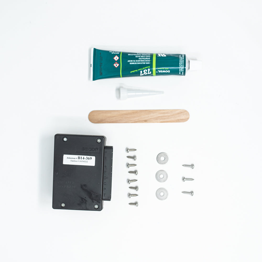 Electronic unit. tube of silicone sealant, application stick and appropriate screws and washers.