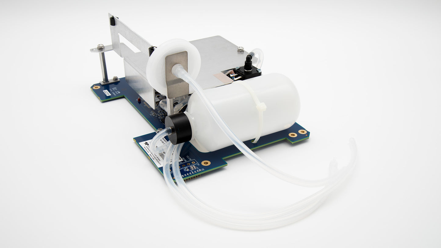 Circuit board with tubing, tank, and bubbler motor.