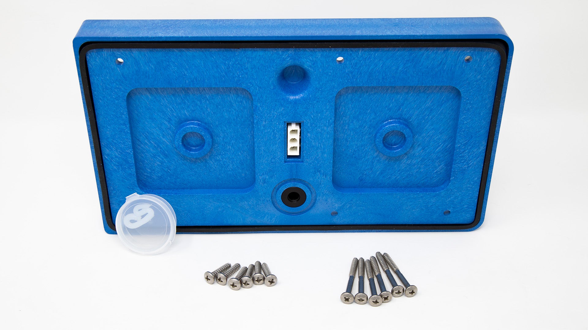 Plastic cover with seal and screws.