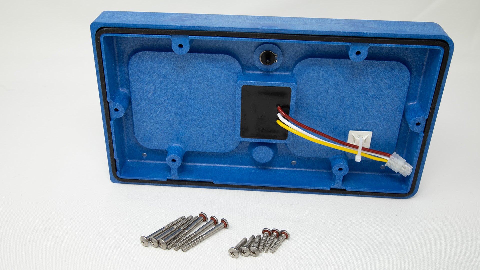 Plastic cover with seal, connecting wires and screws.