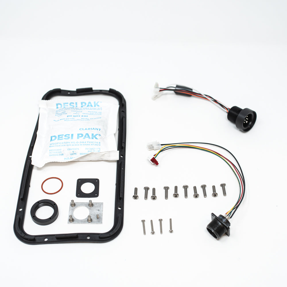 Connector backing plate, controller wiring harness, male connector, desiccant, seal, screws, gasket, o-ring