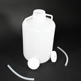 Polyethylene bottle, two discharge tubes, and two caps.