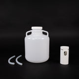Polyethylene round bottle with cap, tube guide and two discharge tubes.