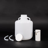 Polyethylene round bottle with cap, tube guide and two discharge tubes.