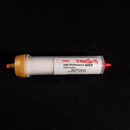 A tube characterized by gold and red caps, emphasizing functionality and ease of use.