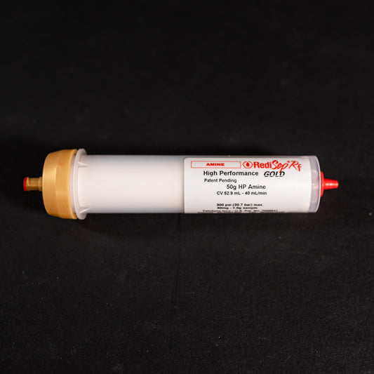 A tube characterized by gold and red caps, emphasizing functionality and ease of use.