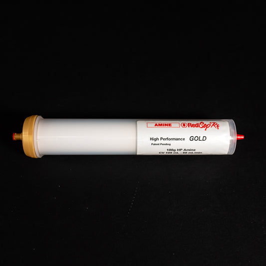 A tube characterized by gold and red caps, emphasizing functionality and ease of use.