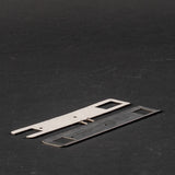 Flat stainless steel plate with screws